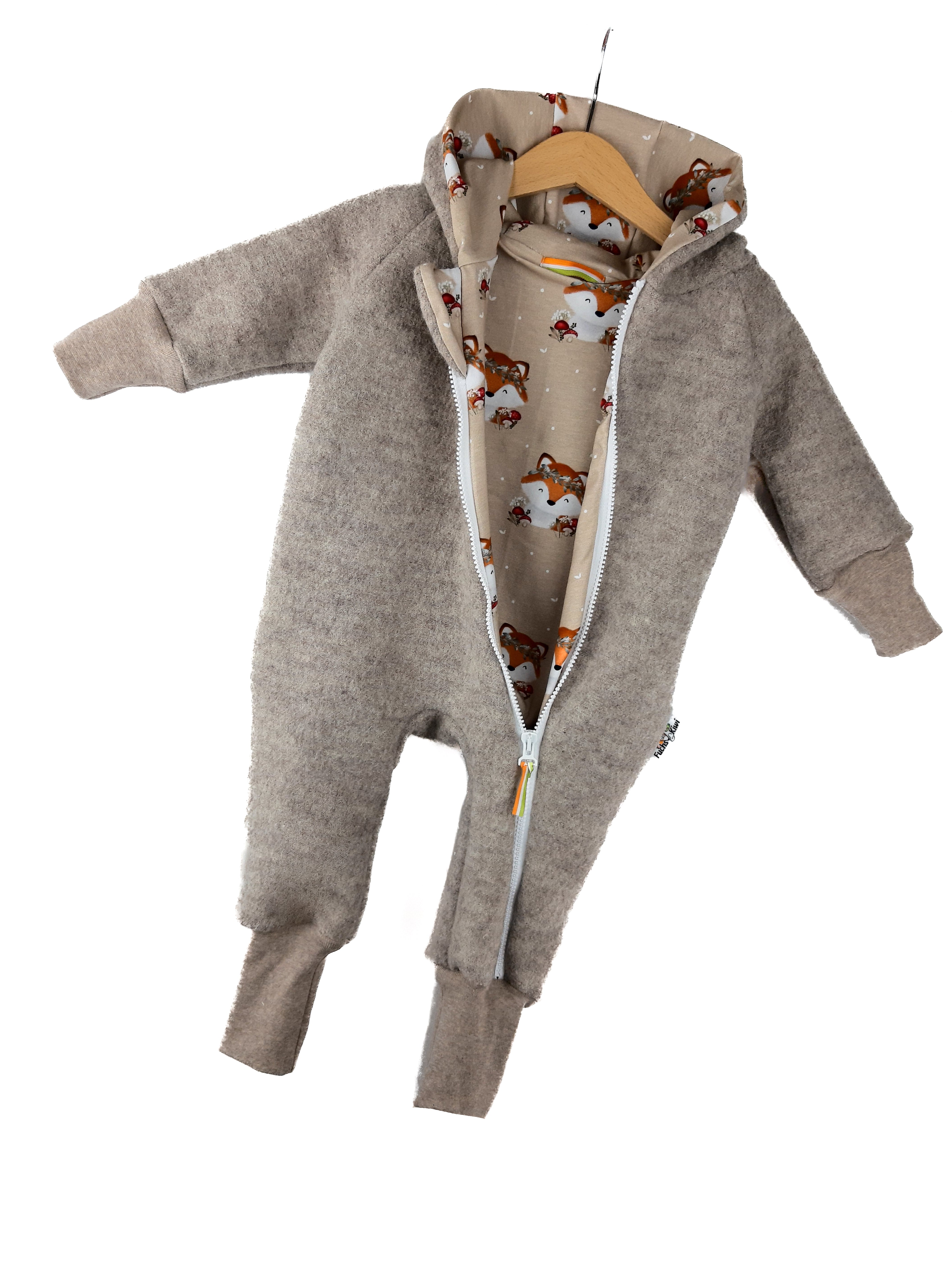 Walk overall made of merino wool, sand marled with fox sand