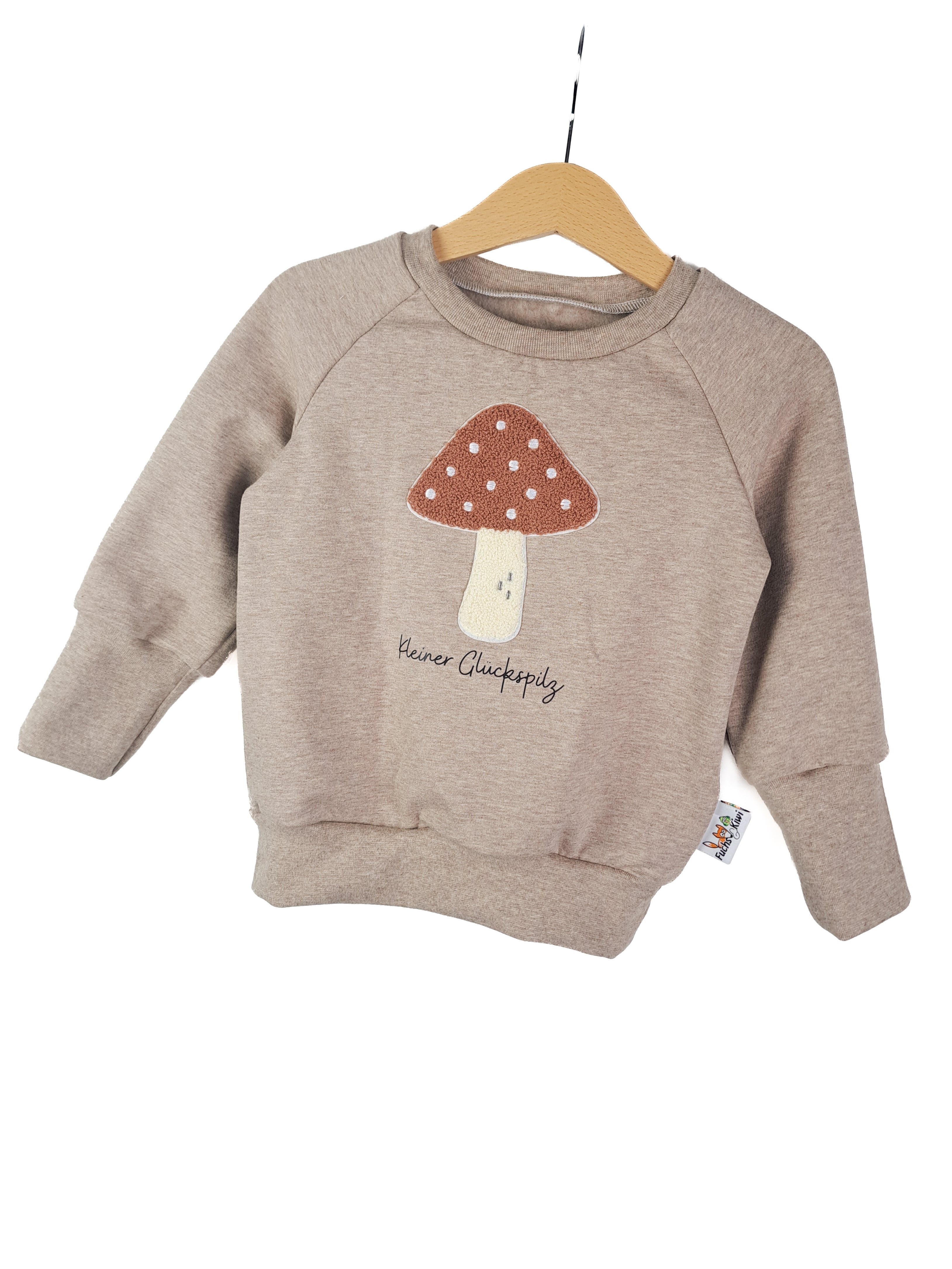 Sweater lucky charm patch sand