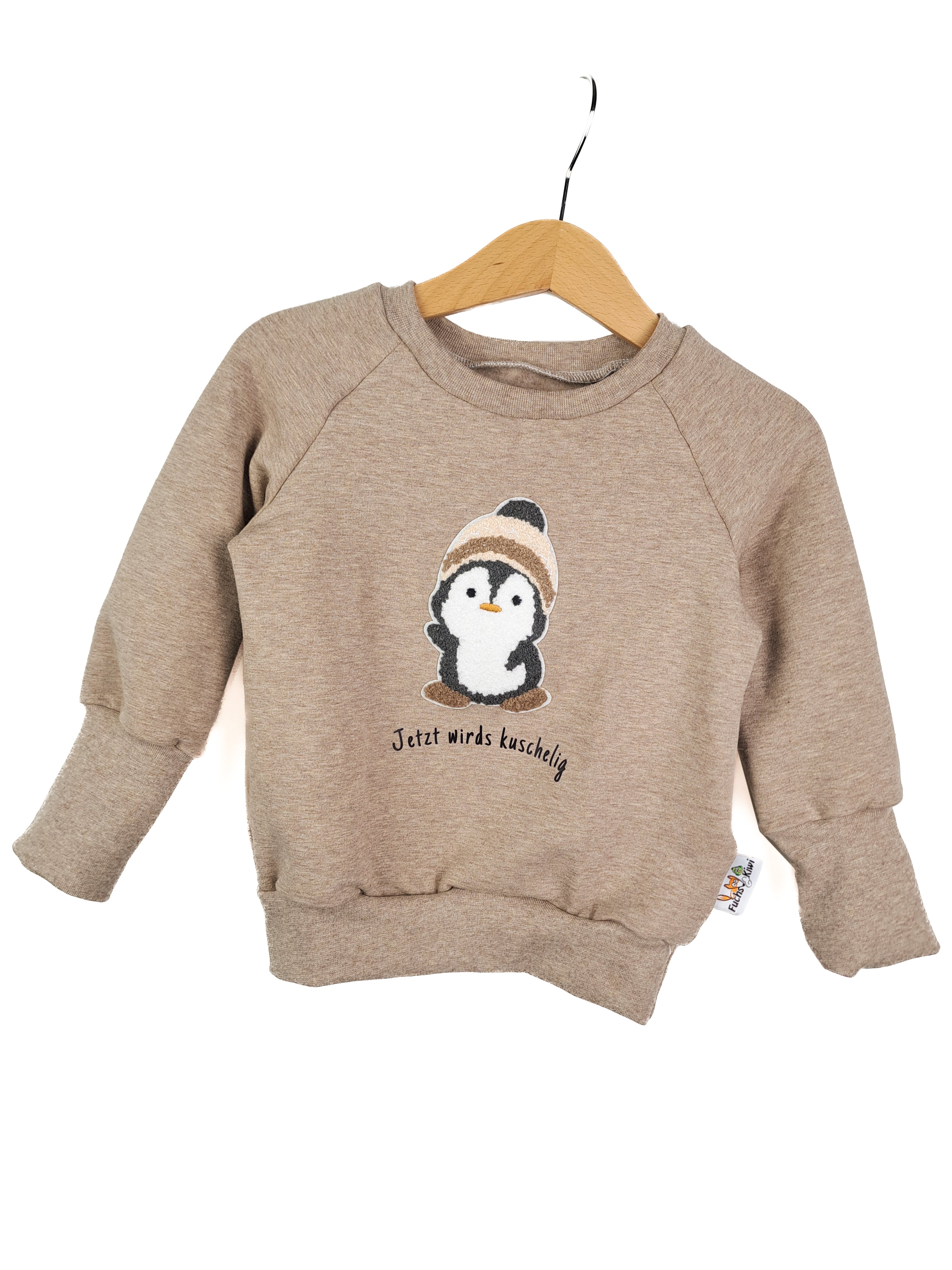 Pullover Pinguin-Patch sand 134/140