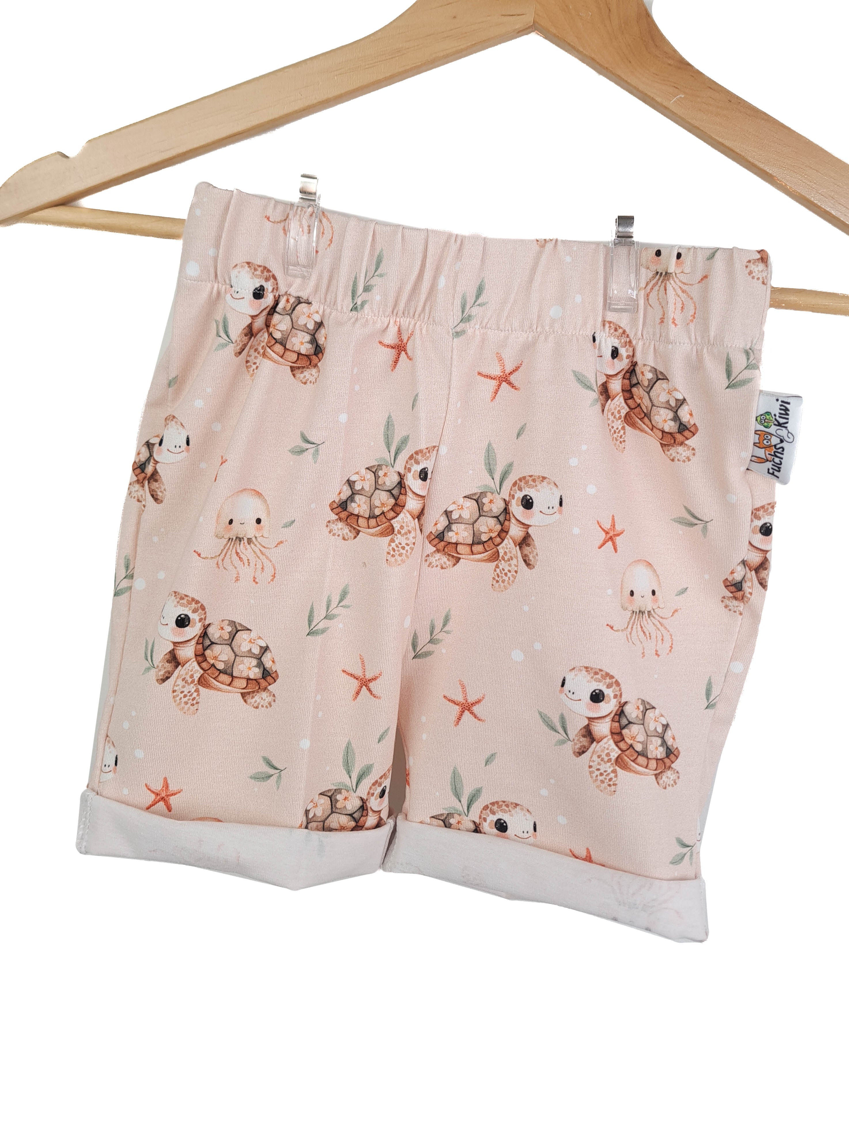 Short shorts underwater world sand