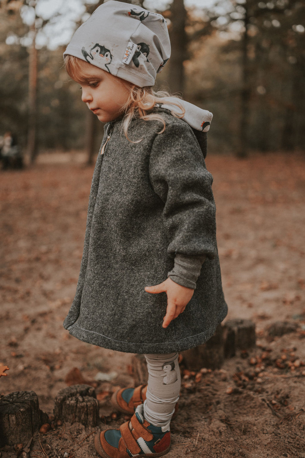 Melange grey boiled wool coat with penguin baby