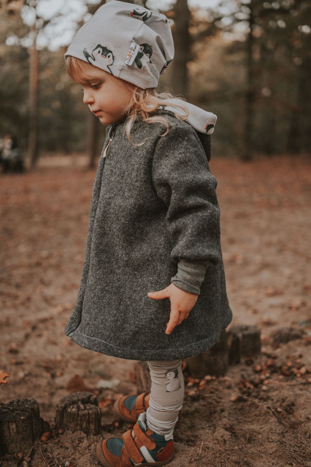 Melange grey boiled wool coat with penguin baby