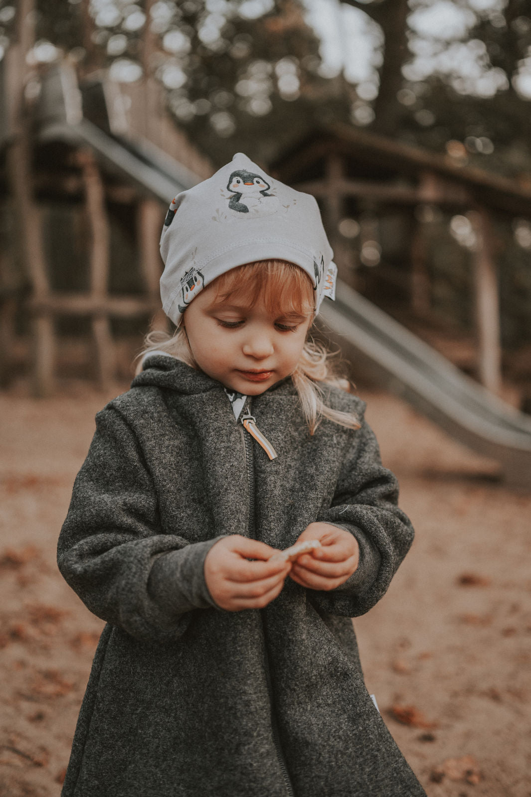 Melange grey boiled wool coat with penguin baby