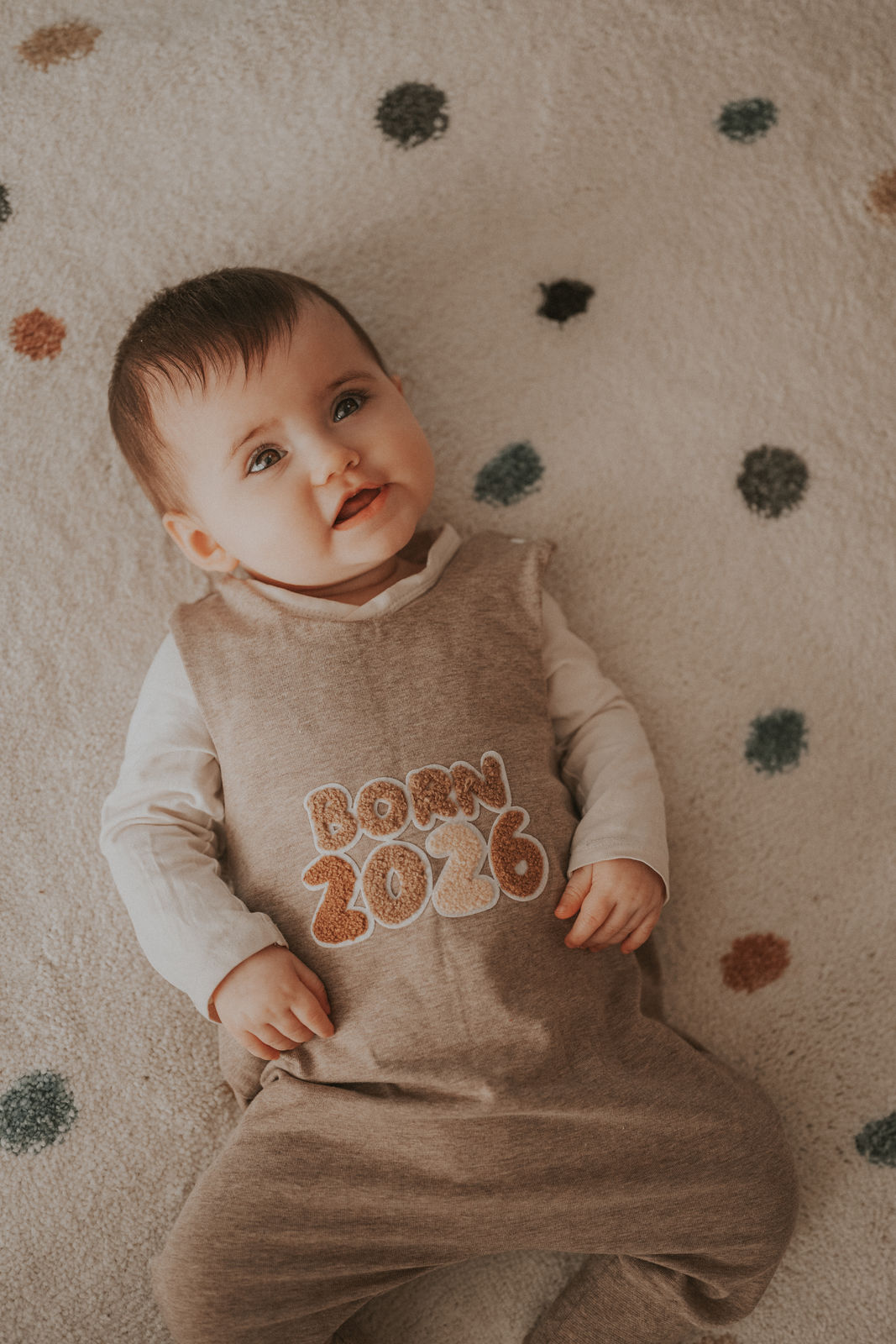 Strampler Born 2026 sand