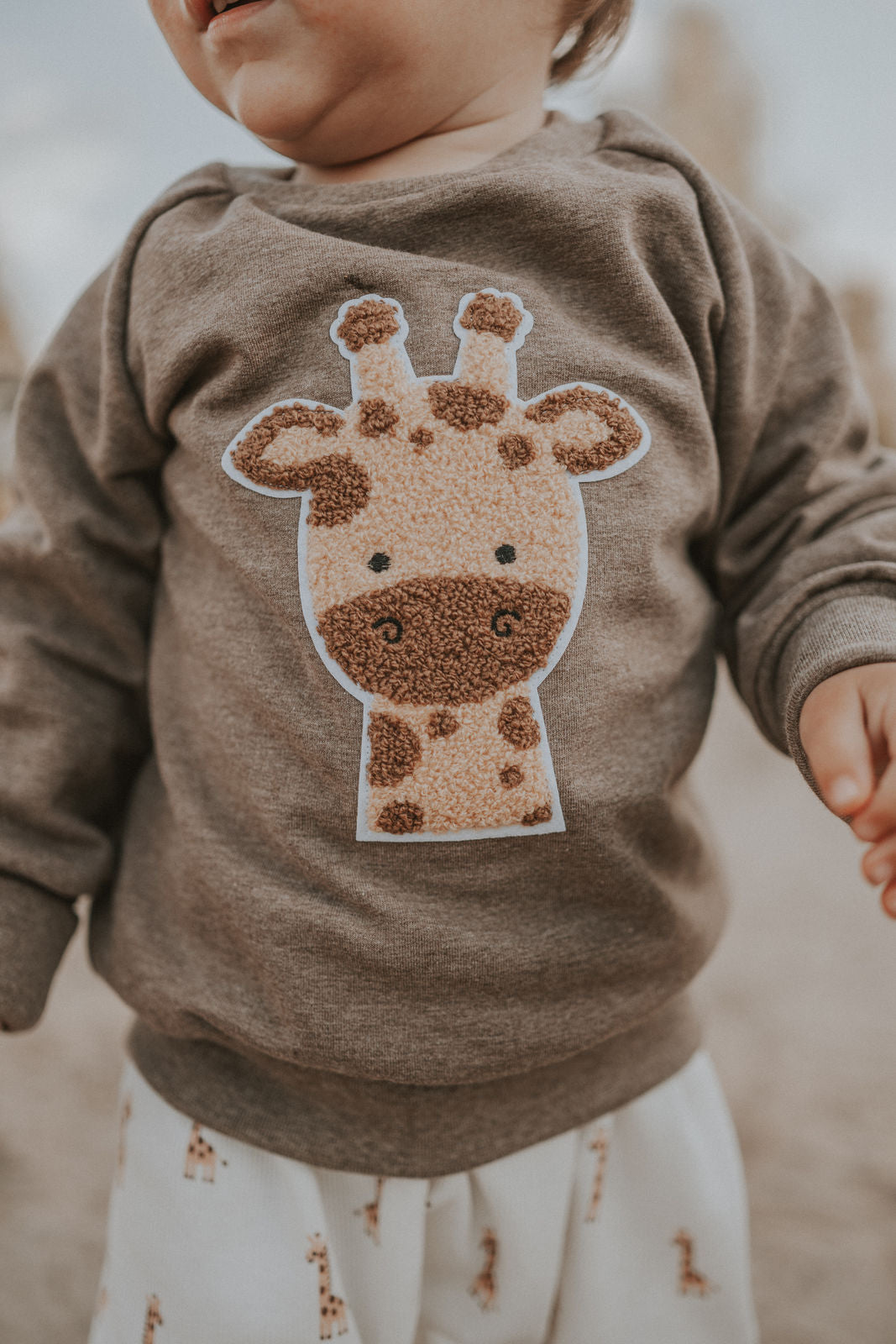 Pullover Giraffenkopf-Patch