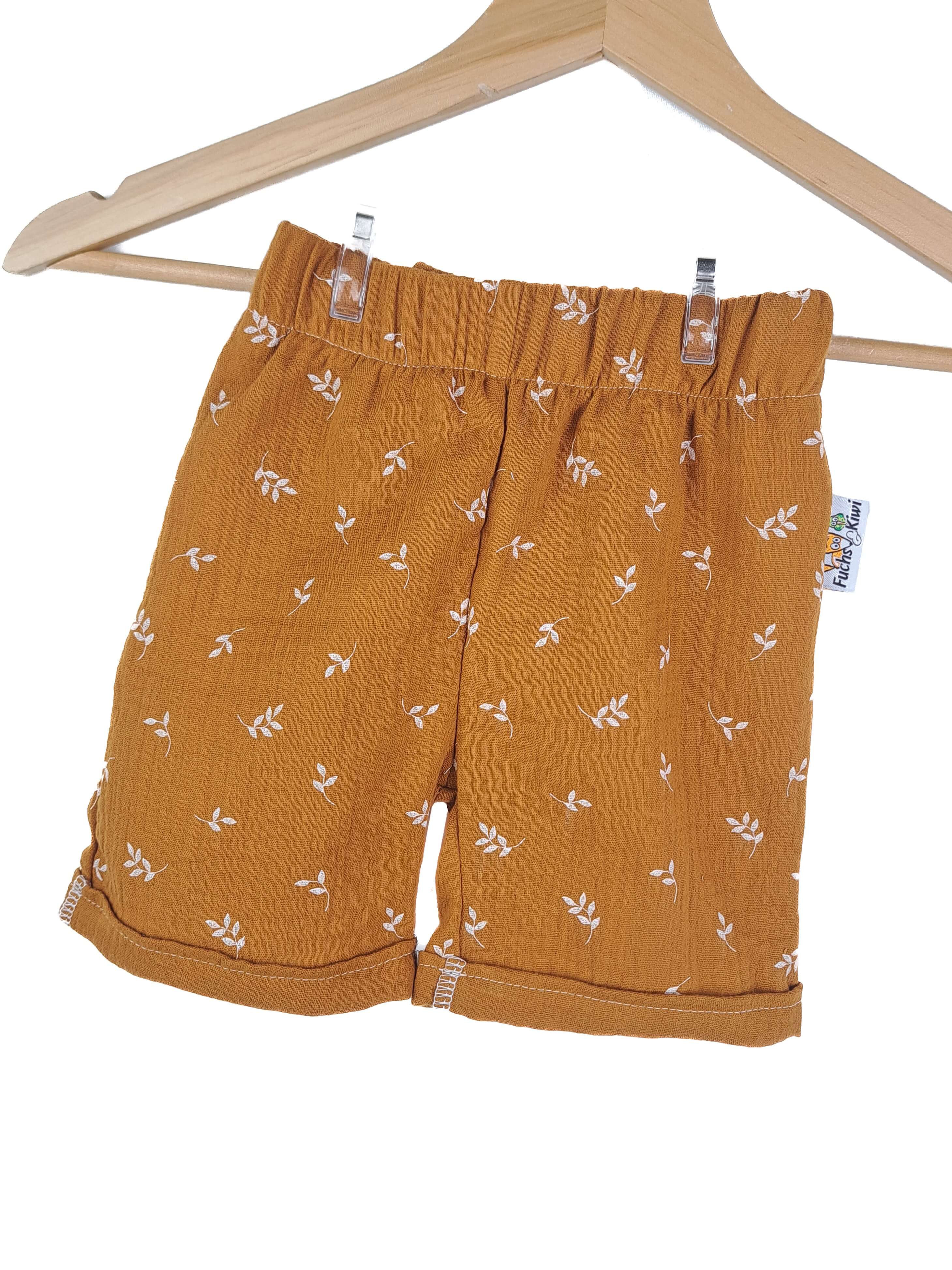 Kurze Shorts Musselin Blätter karamell 86/92